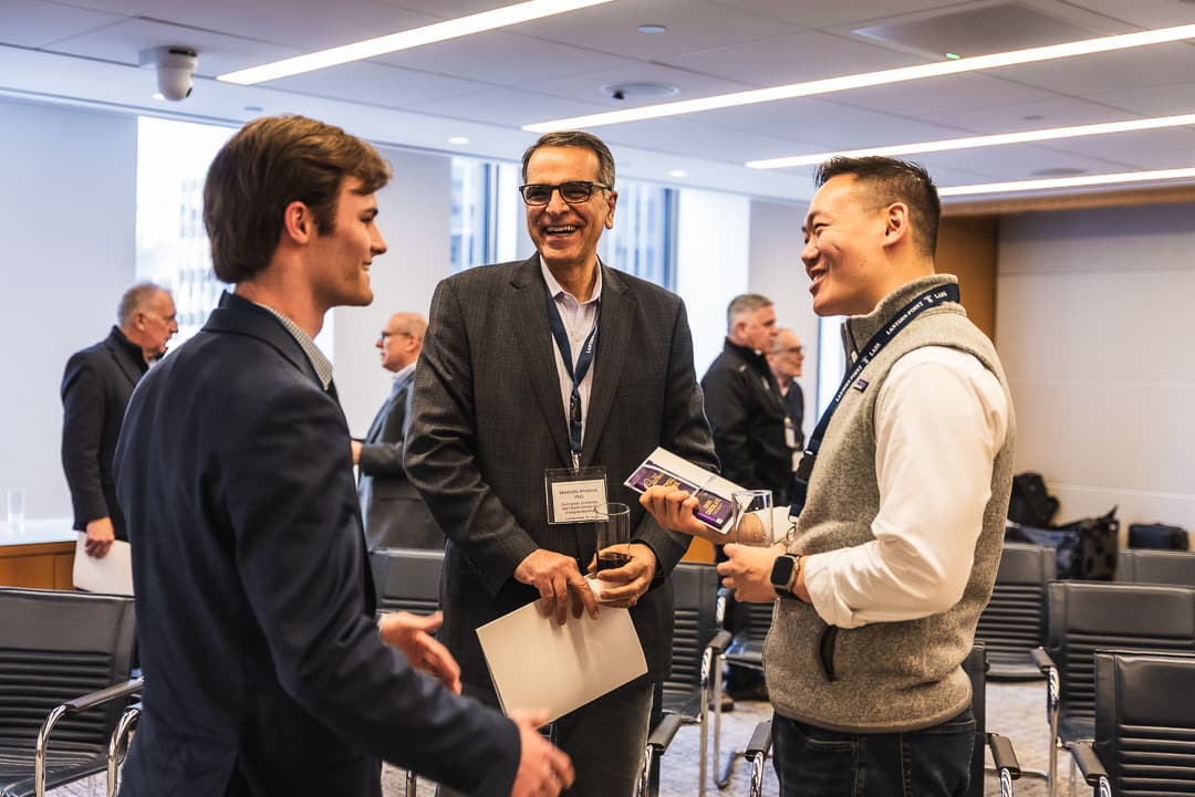 Three guests in conversation at the New York event
